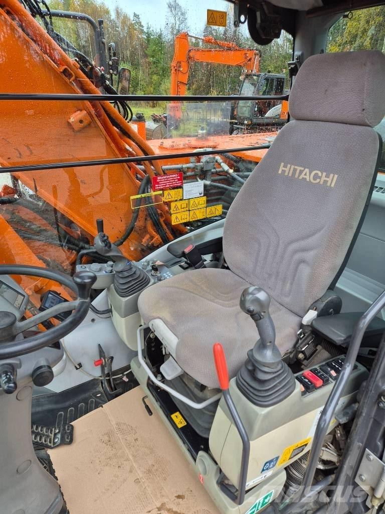 Hitachi ZX 140 W T-5 حفارات بعجل