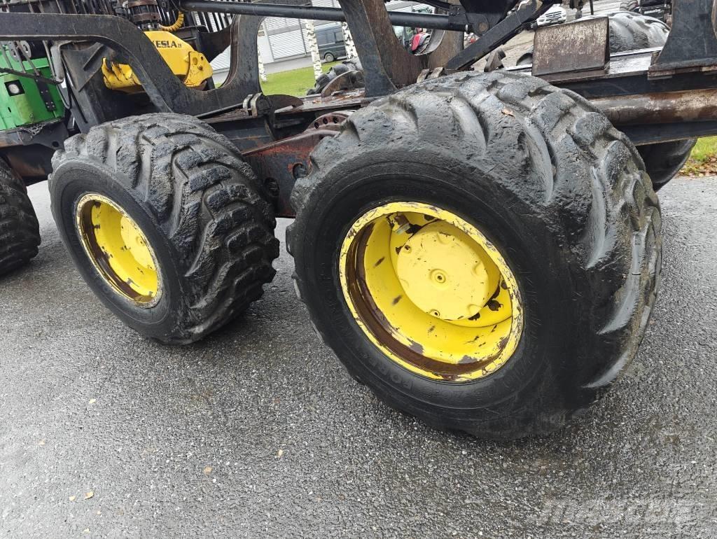 John Deere 1210 E شاحنات