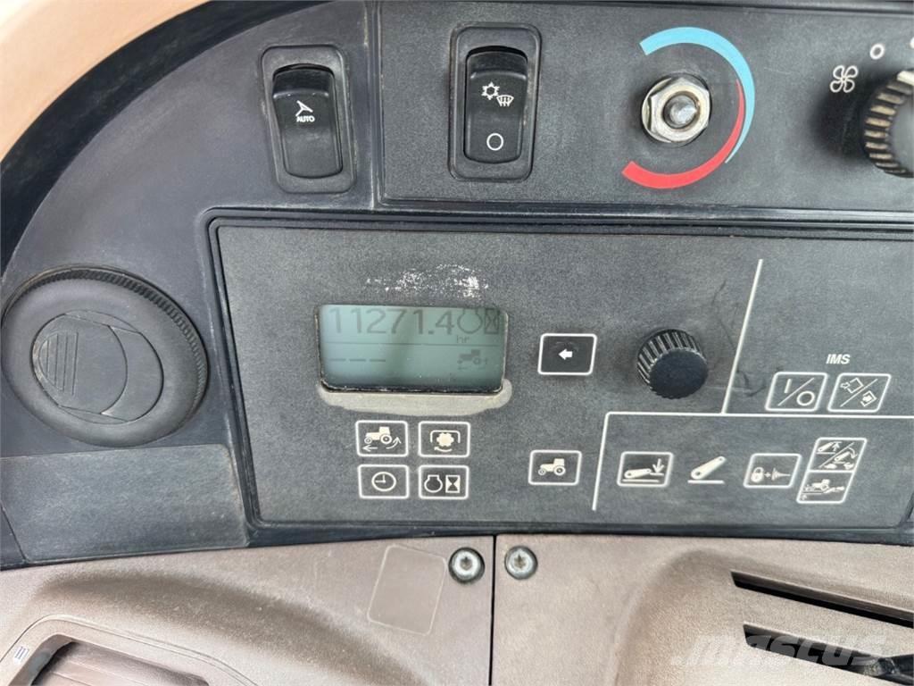 John Deere 7730 الجرارات