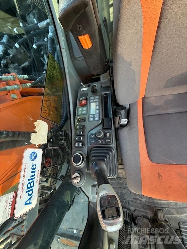 Doosan DX 140 W-5 حفارات بعجل