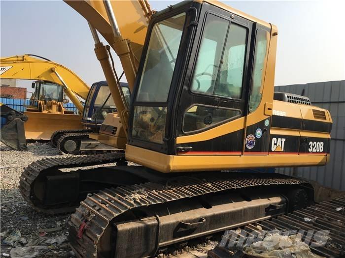 CAT 320 B حفارات زحافة