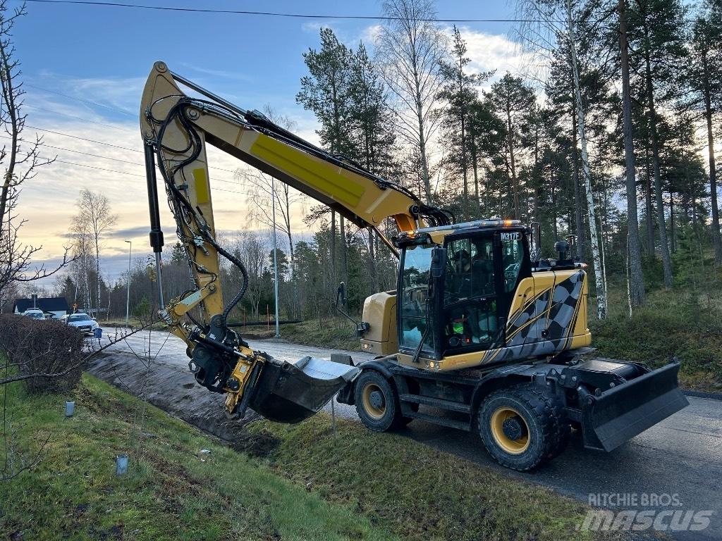 CAT M 317F حفارات بعجل