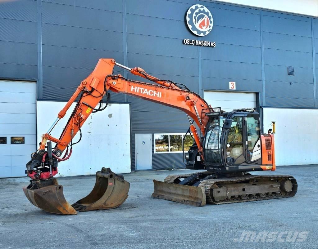 Hitachi ZX 135 US-6 حفارات زحافة