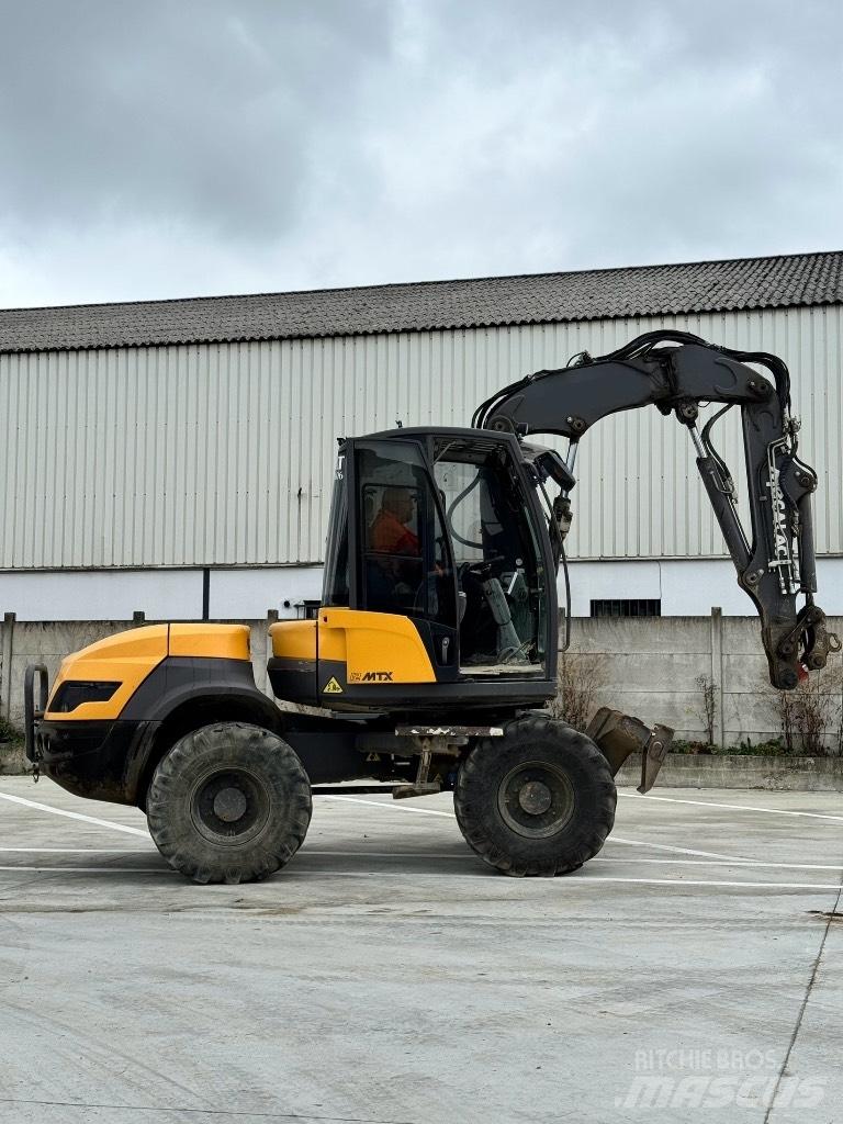 Mecalac 12 MTX حفارات بعجل