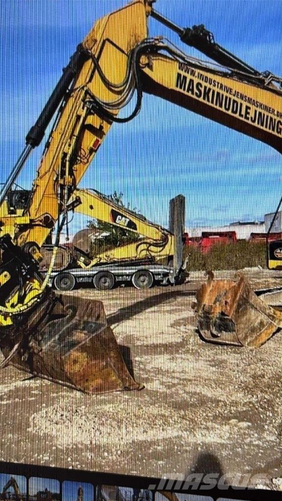 CAT M315F حفارات بعجل