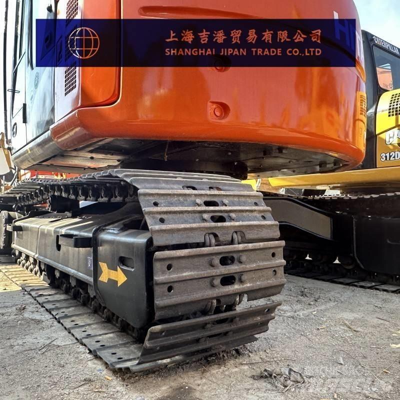 Hitachi ZX 135 حفارات زحافة