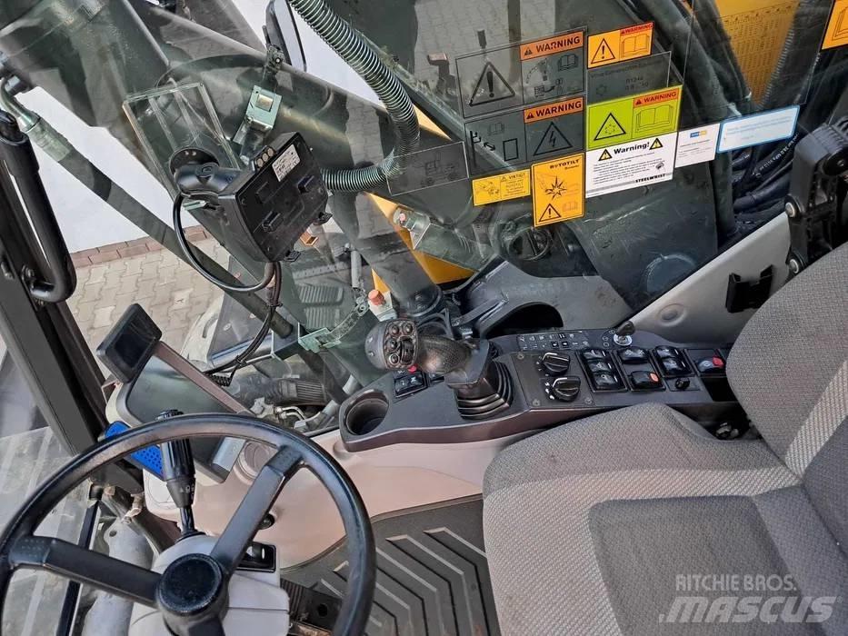 Volvo EW 140 D حفارات بعجل