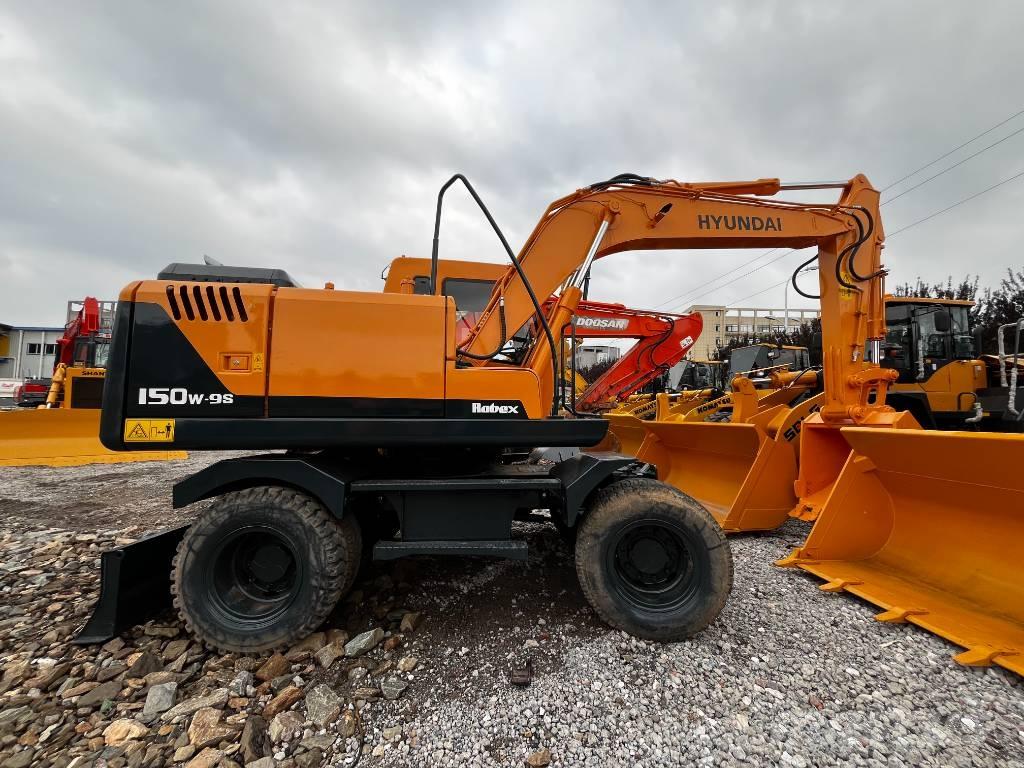 Hyundai 150W-9 حفارات بعجل
