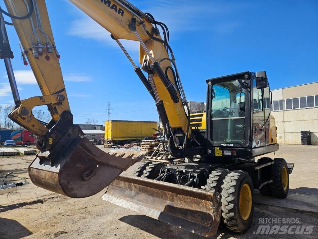 Yanmar B 110 W لوادر ذات جرافات عكسية