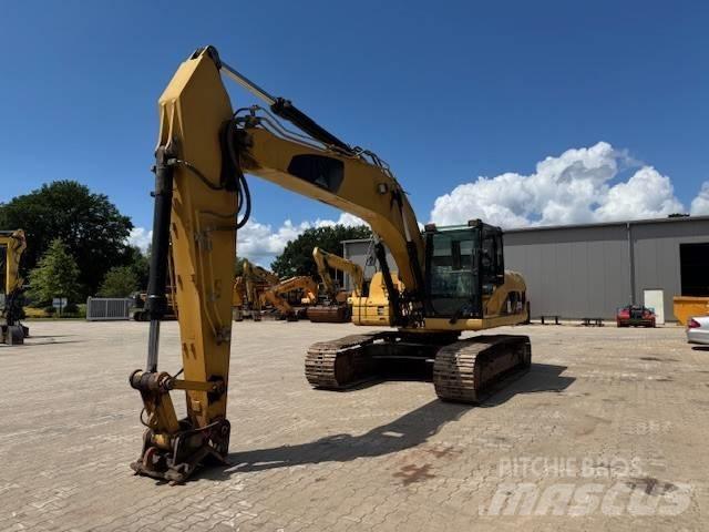 CAT 323 D L حفارات زحافة