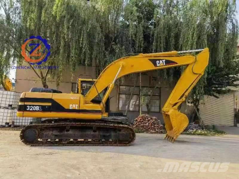 CAT 320 B L حفارات زحافة