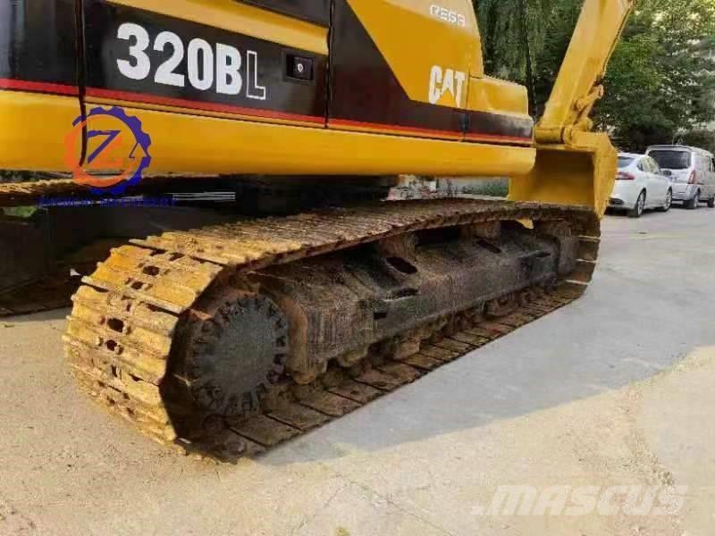 CAT 320 B L حفارات زحافة