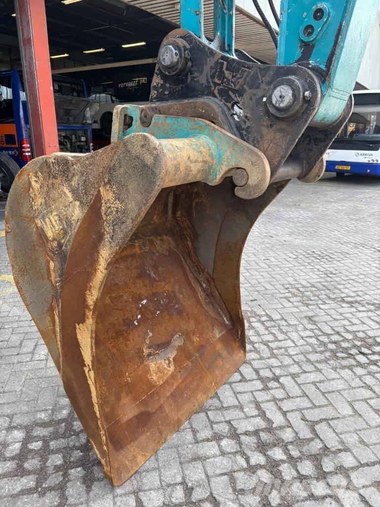 Doosan DX 210 W حفارات بعجل