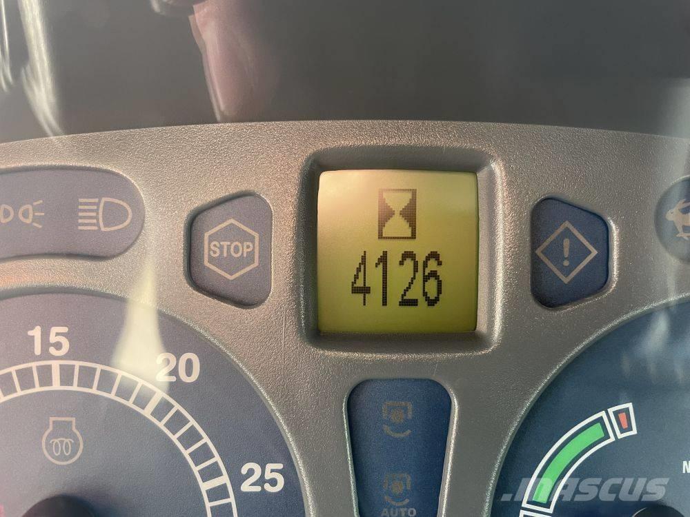 New Holland TL 100 A الجرارات