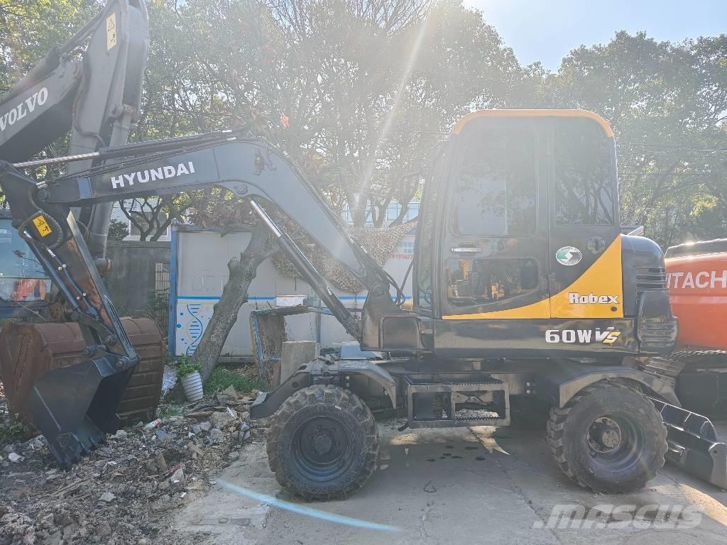 Hyundai 60 W VS حفارات صغيرة أقل من 7 طن (حفارات صغيرة)