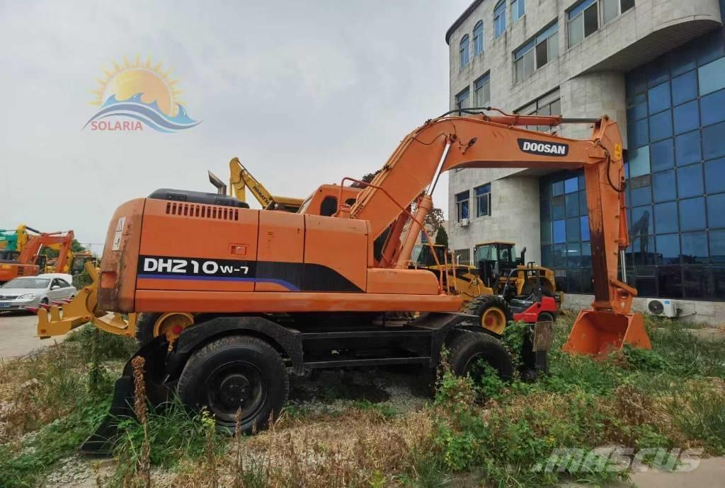 Doosan DH 210 W-7 حفارات بعجل