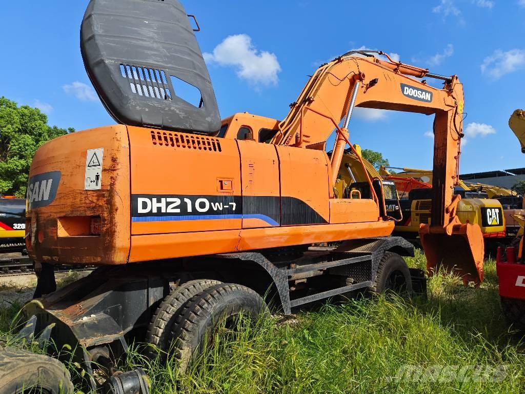 Doosan DH 210 W-7 حفارات بعجل