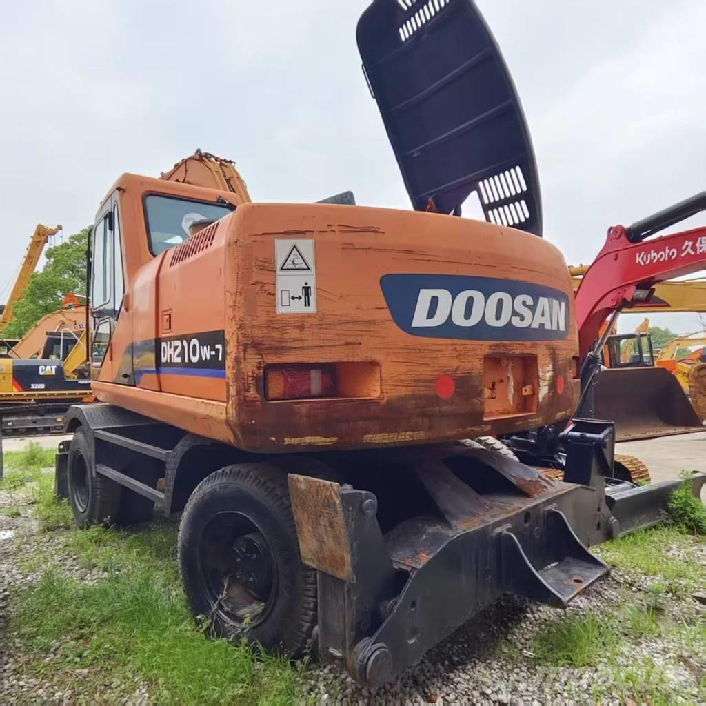 Doosan DH 210 W-7 حفارات بعجل
