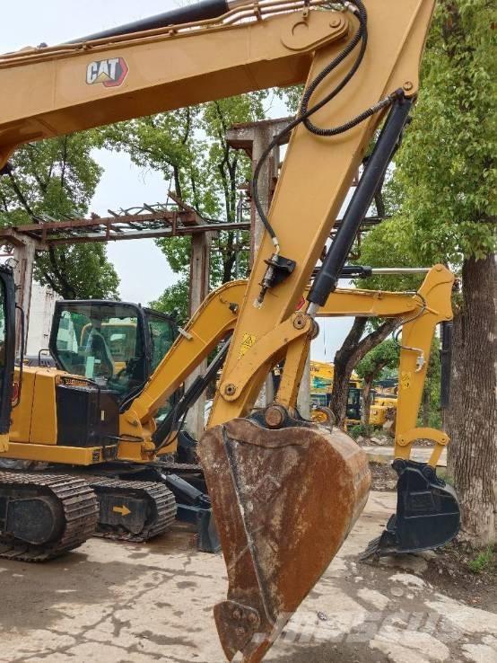CAT 310 حفارات زحافة