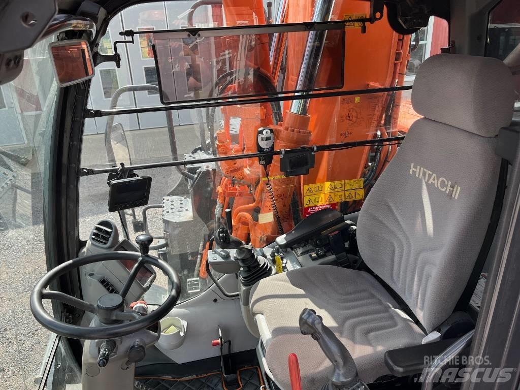 Hitachi ZX 140 W-5 حفارات بعجل