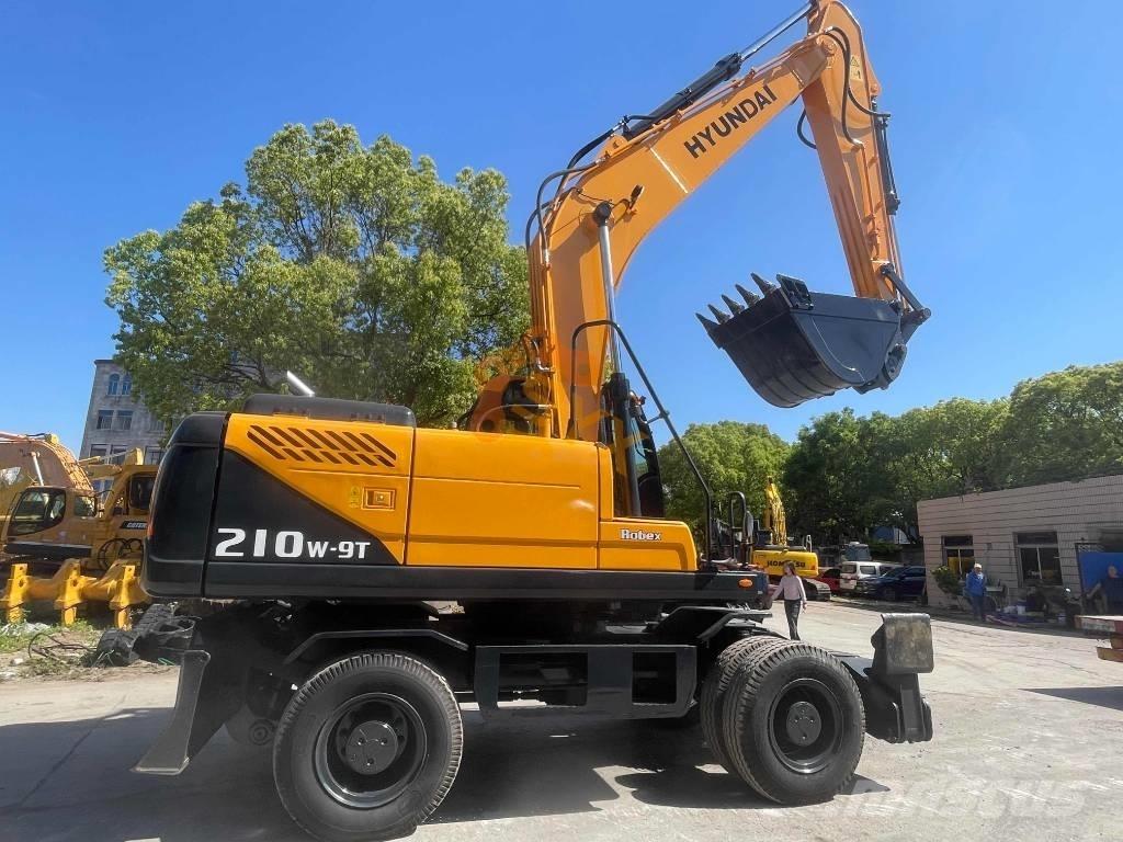 Hyundai 210W-9 حفارات بعجل