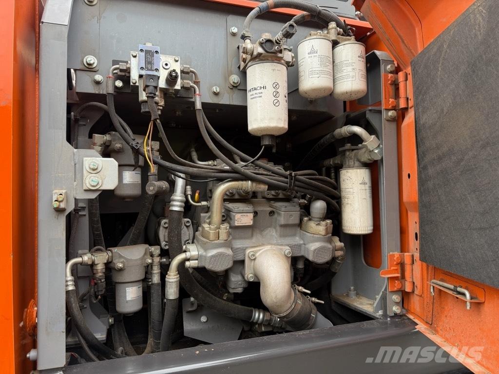 Hitachi ZX 140 W-6 حفارات بعجل