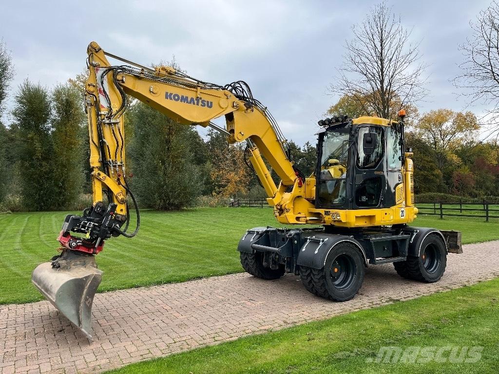 Komatsu PW 118 حفارات بعجل