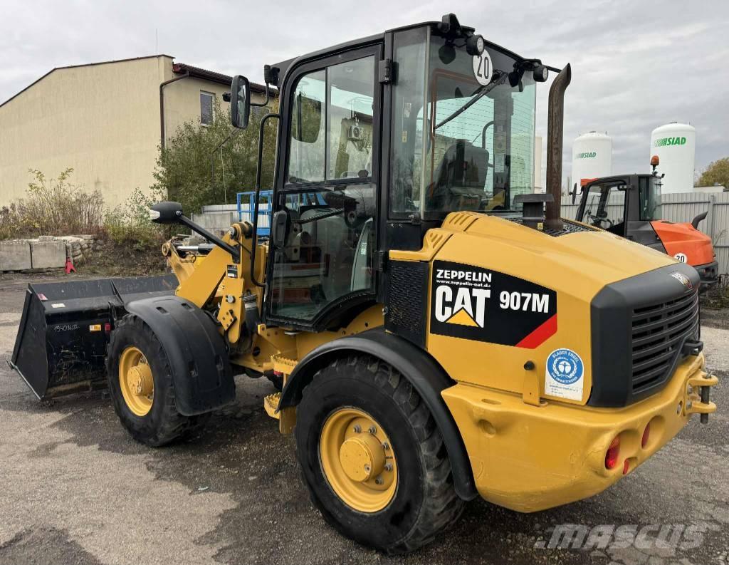 CAT 907 M لوادر بعجل