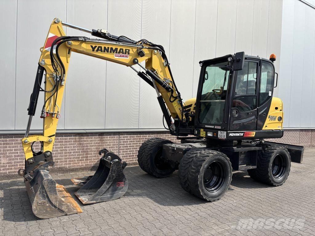 Yanmar B75W حفارات بعجل