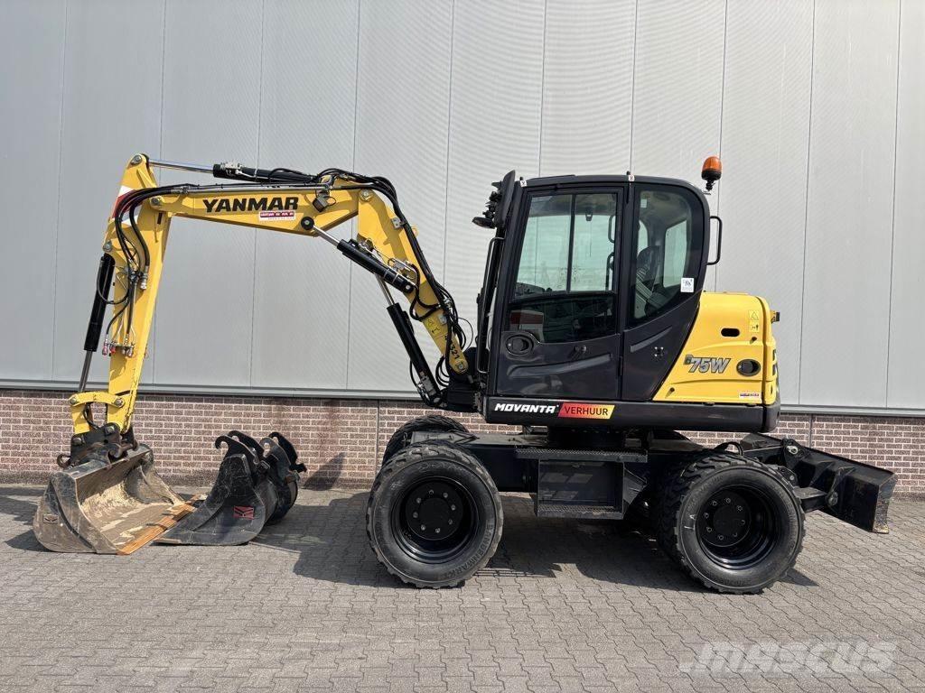 Yanmar B75W حفارات بعجل