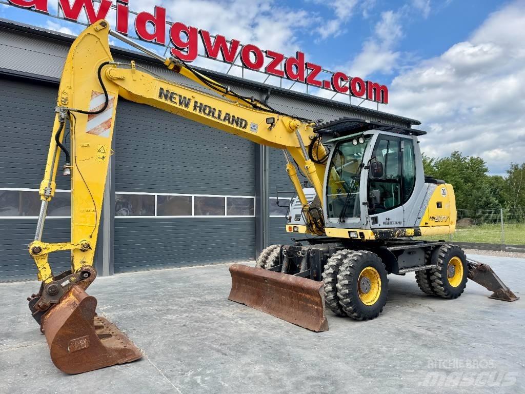 New Holland MH City حفارات بعجل