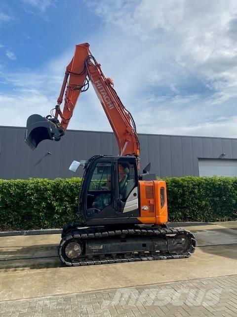 Hitachi ZX 135 US-6 حفارات زحافة