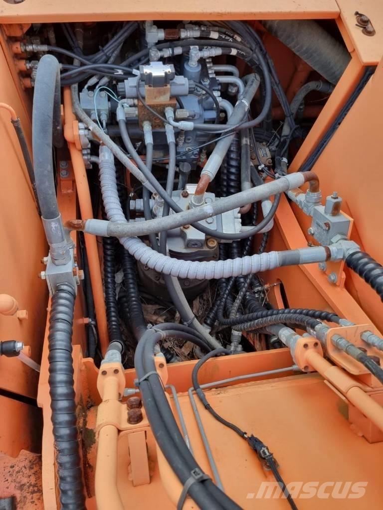 Doosan DX 210 W حفارات بعجل
