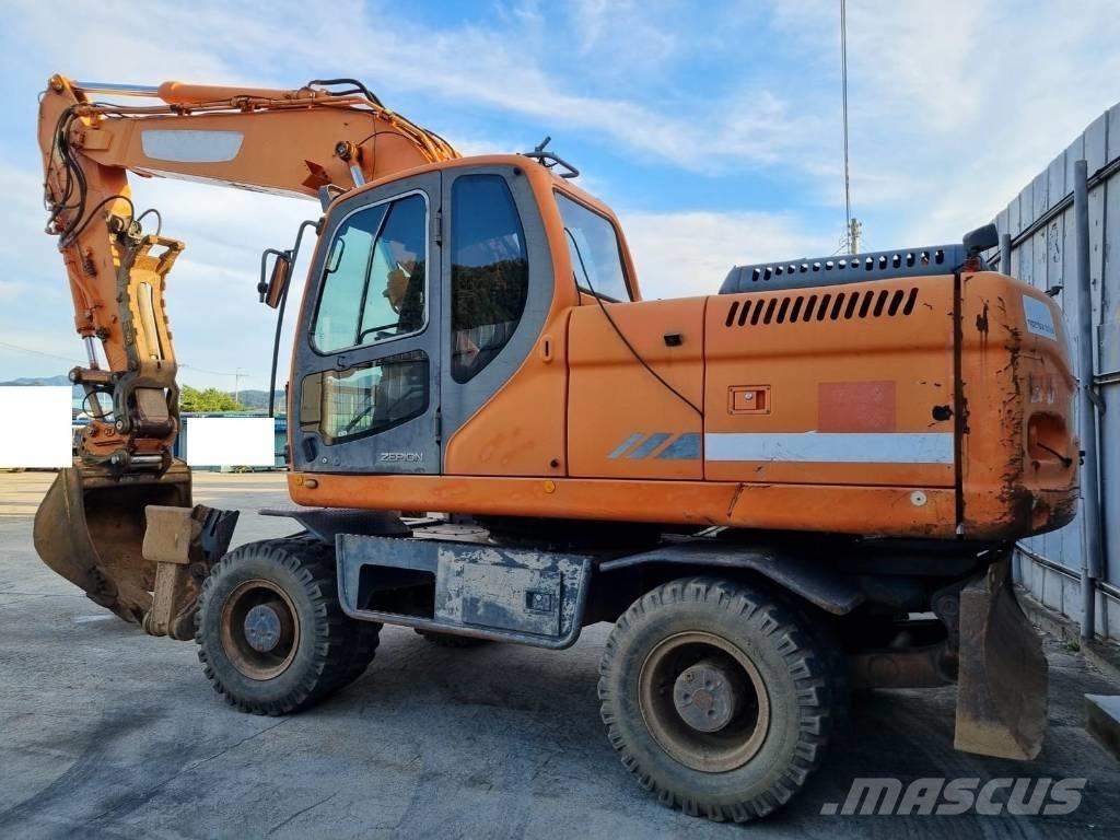 Doosan DX 210 W حفارات بعجل