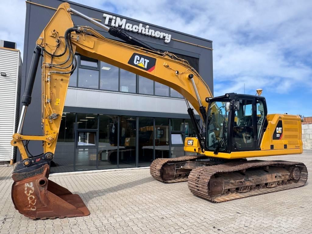 CAT 323 حفارات زحافة