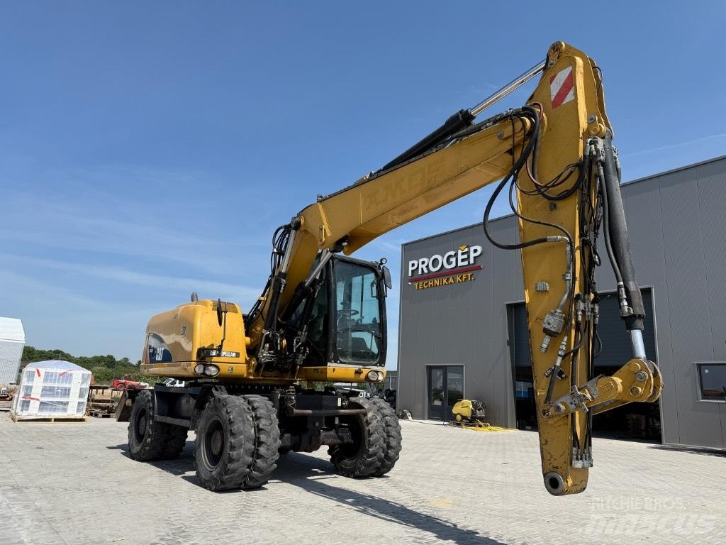 CAT M 313 D VAH حفارات بعجل