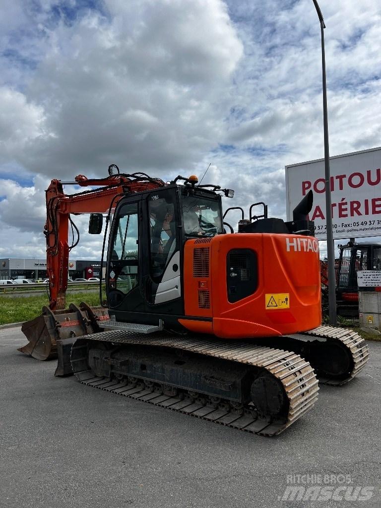 Hitachi ZX 135 US-6 حفارات زحافة