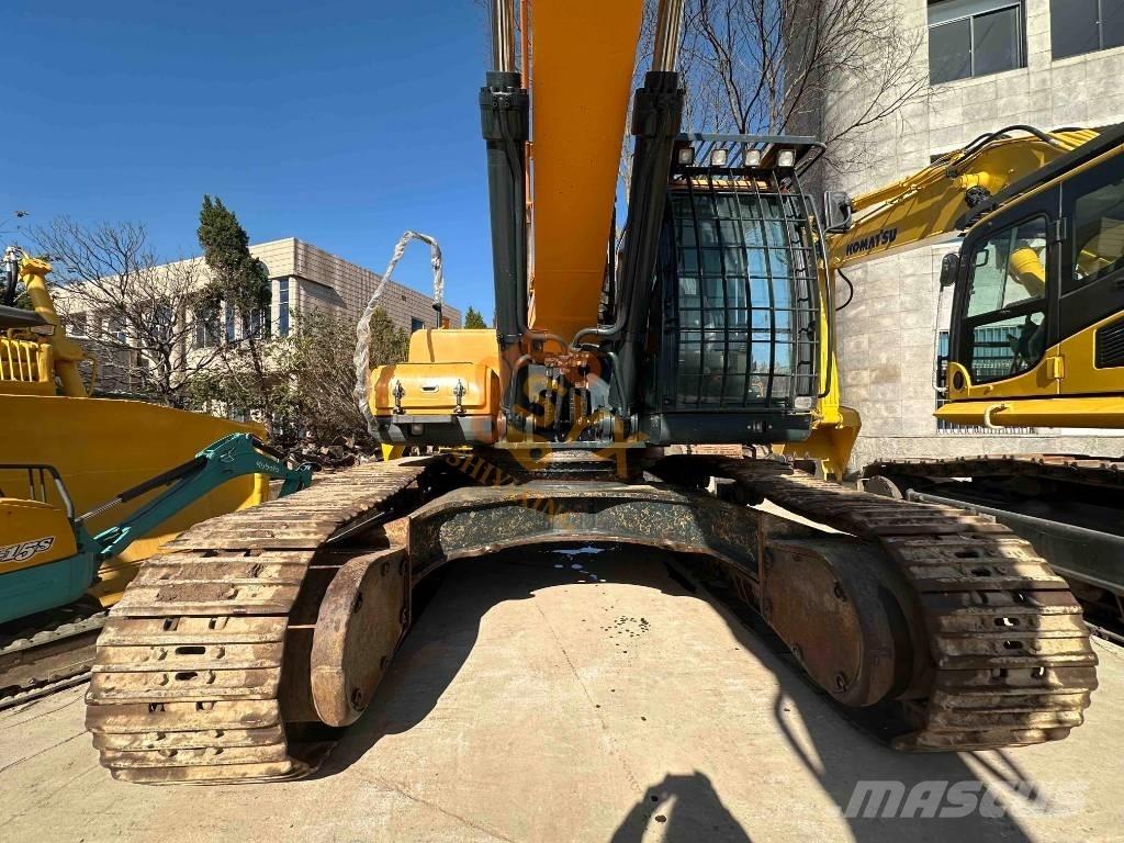 Hyundai Robex 520 VS حفارات زحافة