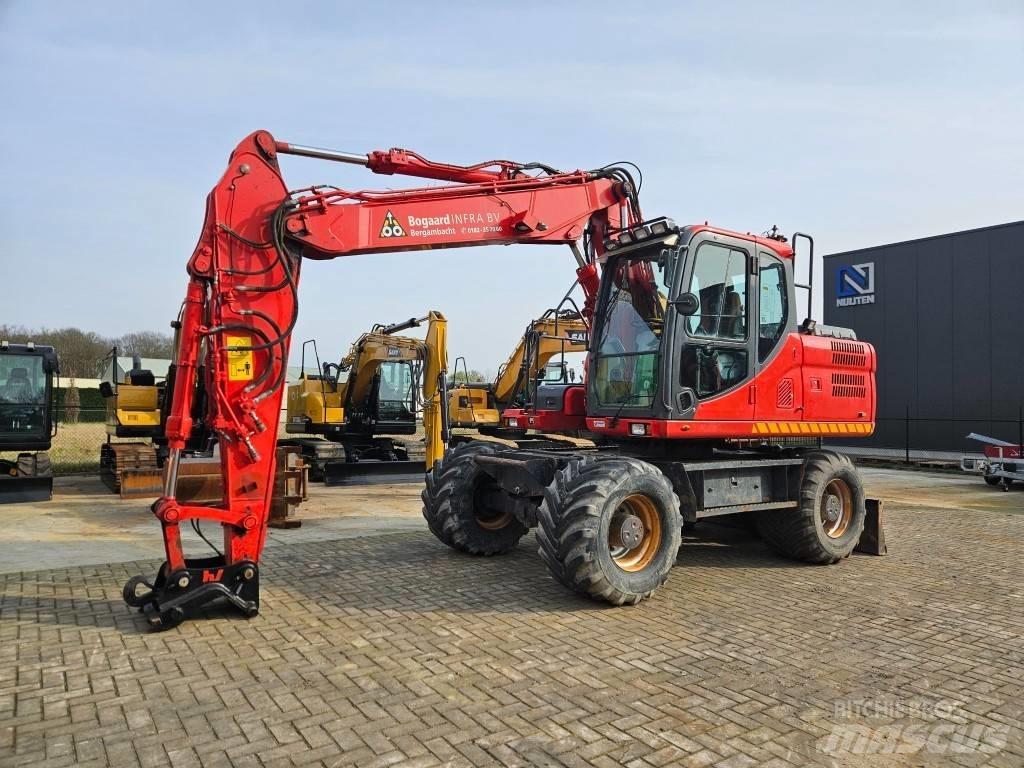 Doosan DX 140 W-3 حفارات بعجل