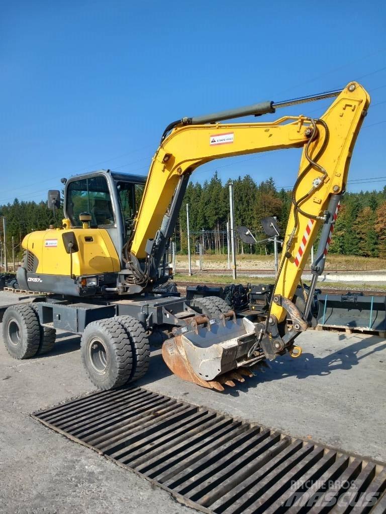 Doosan DX 57 W-5 حفارات بعجل