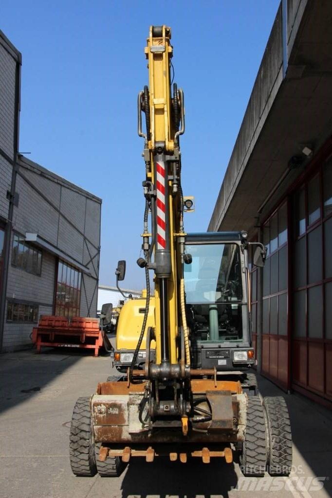 Doosan DX 57 W-5 حفارات بعجل