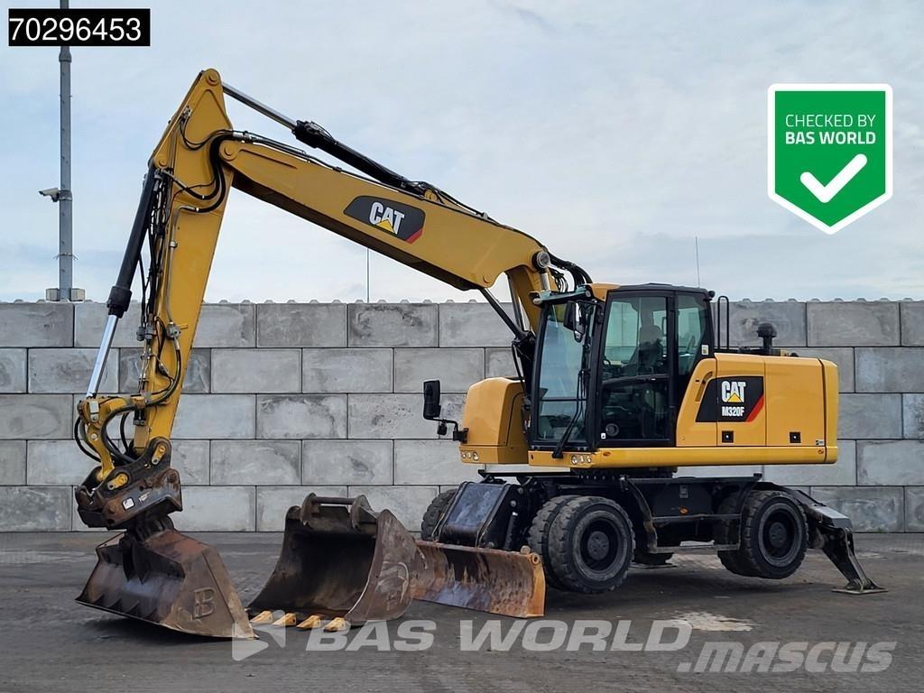 CAT M320 F حفارات بعجل