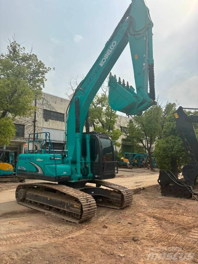 Kobelco SK 210 حفارات زحافة