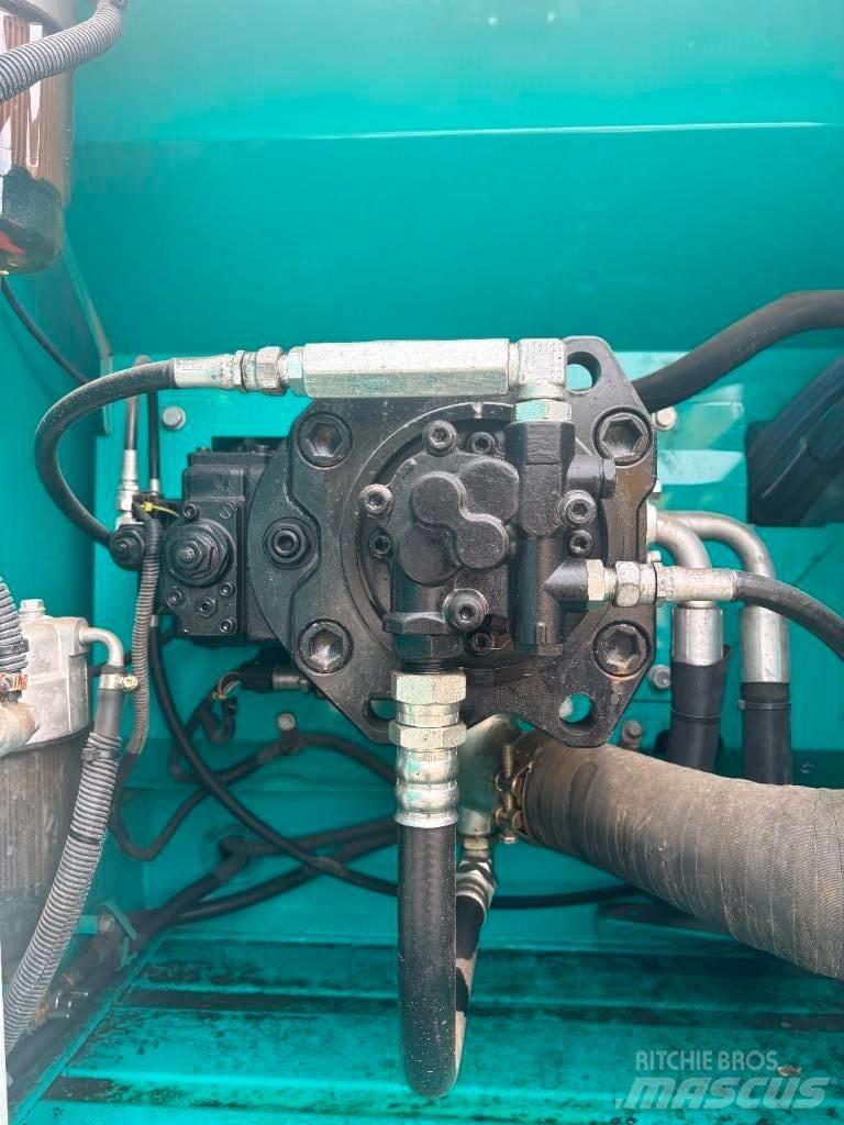 Kobelco SK 210 حفارات زحافة