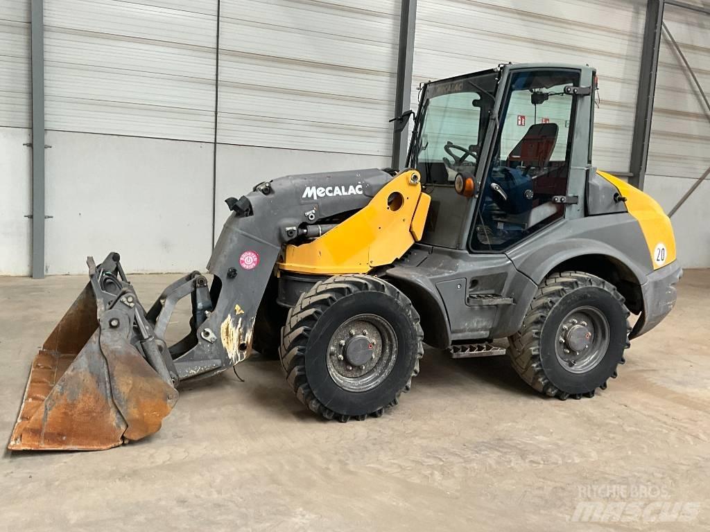 Mecalac AS 700 لوادر بعجل