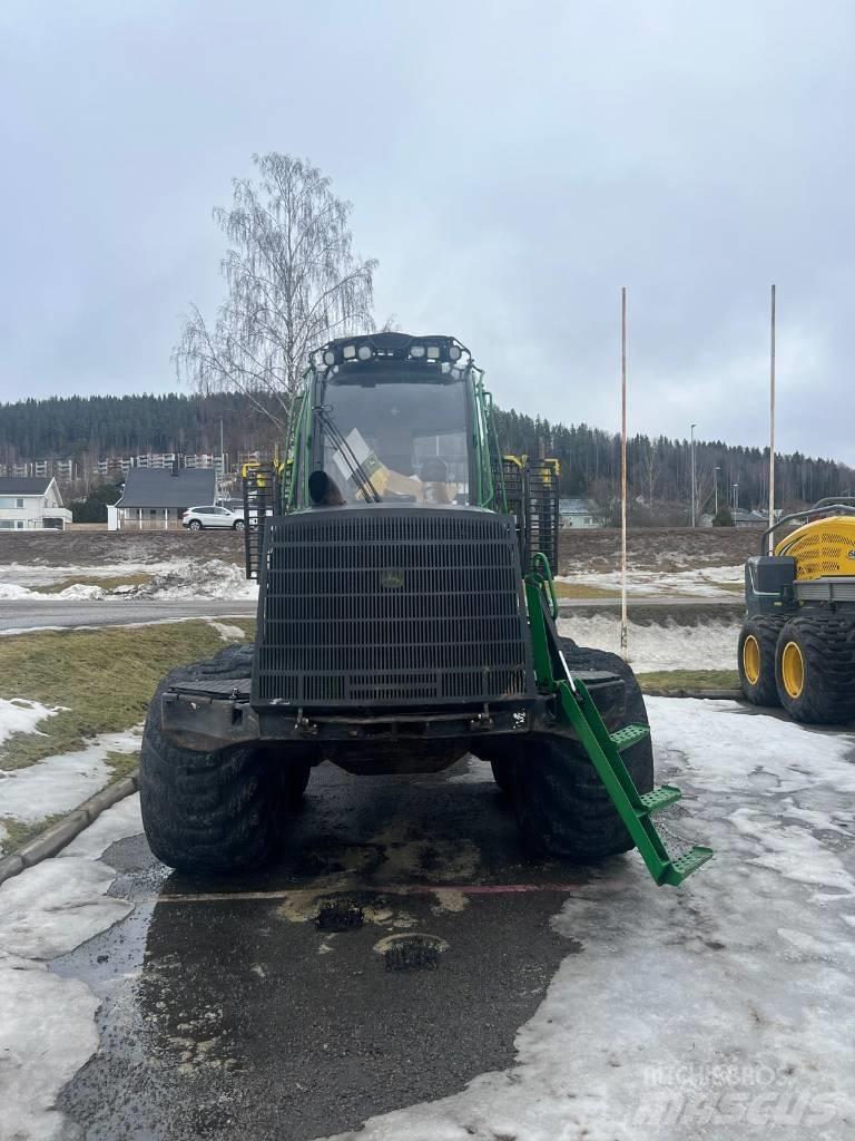 John Deere 1210 E شاحنات