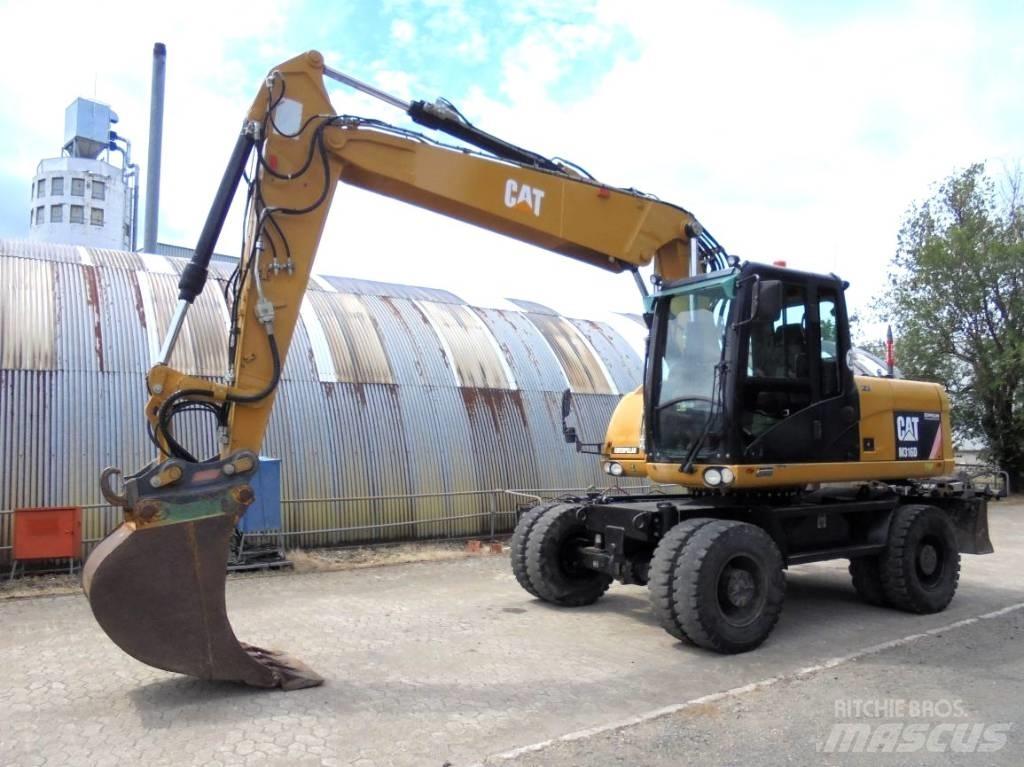 CAT M 316 D حفارات بعجل