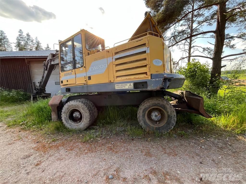 Åkerman EW200 4X4 حفارات بعجل