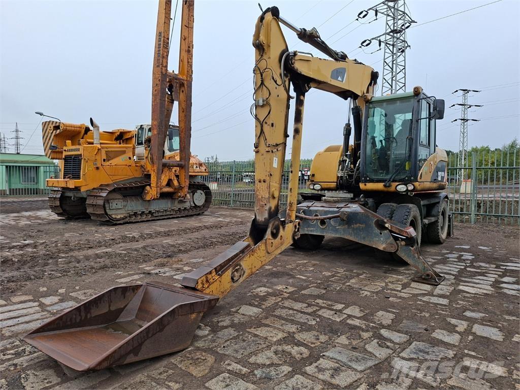 CAT M313D 4X4 أخرى