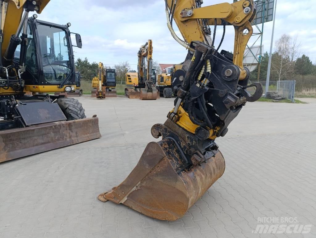 CAT M 313 D حفارات بعجل